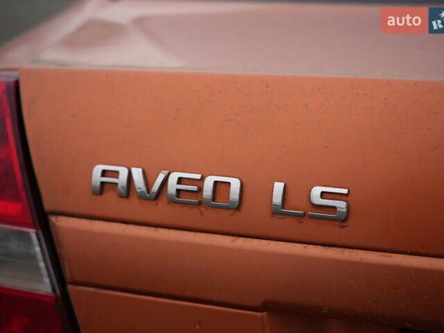 Помаранчевий Шевроле Авео, об'ємом двигуна 1.5 л та пробігом 300 тис. км за 2606 $, фото 3 на Automoto.ua