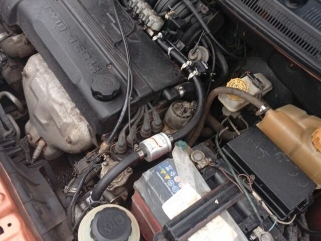 Оранжевый Шевроле Авео, объемом двигателя 0 л и пробегом 341 тыс. км за 3500 $, фото 6 на Automoto.ua