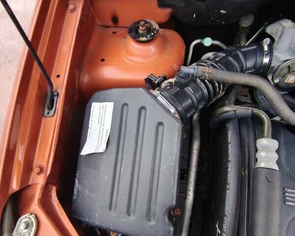 Оранжевый Шевроле Авео, объемом двигателя 1.6 л и пробегом 161 тыс. км за 2999 $, фото 4 на Automoto.ua