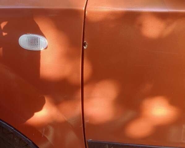 Оранжевый Шевроле Авео, объемом двигателя 1.5 л и пробегом 235 тыс. км за 2800 $, фото 5 на Automoto.ua