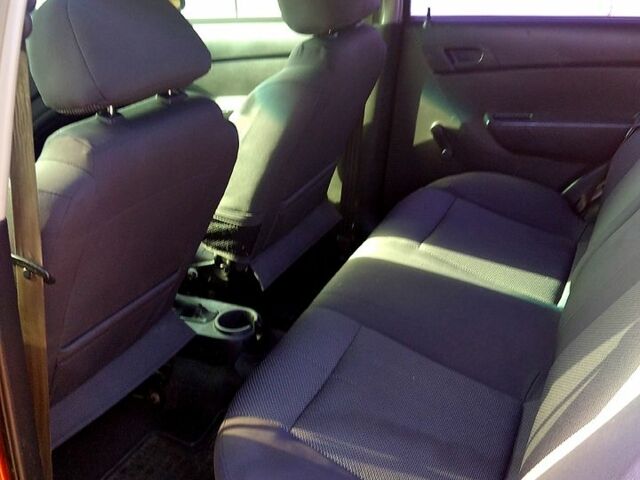 Оранжевый Шевроле Авео, объемом двигателя 1.5 л и пробегом 350 тыс. км за 3700 $, фото 5 на Automoto.ua