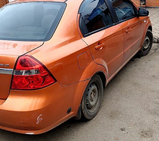 Оранжевый Шевроле Авео, объемом двигателя 1.6 л и пробегом 150 тыс. км за 2700 $, фото 4 на Automoto.ua