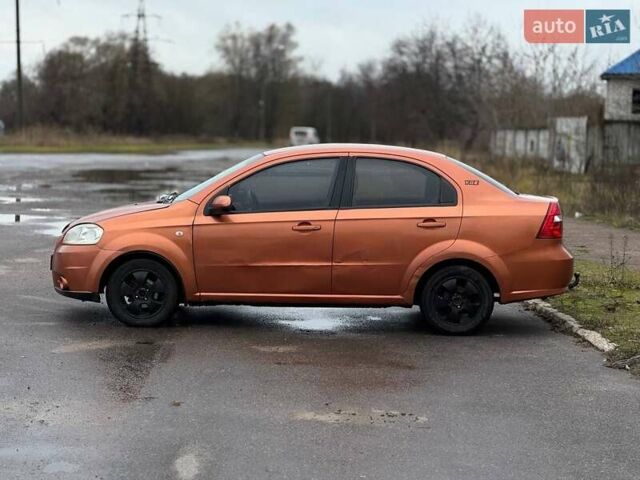 Оранжевый Шевроле Авео, объемом двигателя 1.6 л и пробегом 294 тыс. км за 2350 $, фото 1 на Automoto.ua