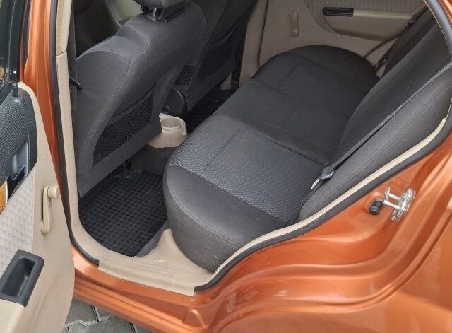 Оранжевый Шевроле Авео, объемом двигателя 1.6 л и пробегом 231 тыс. км за 2900 $, фото 5 на Automoto.ua