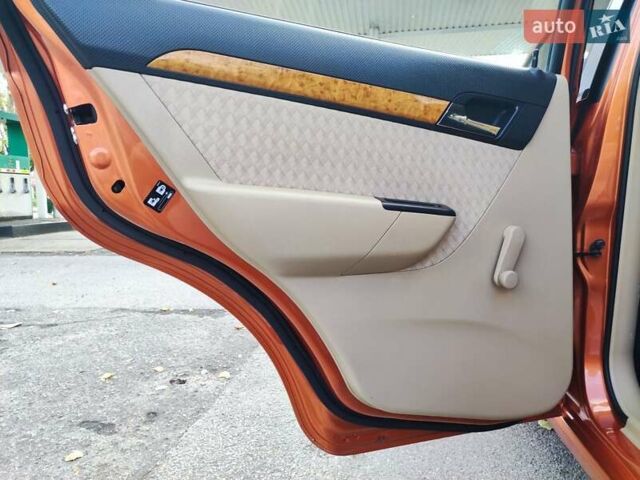 Оранжевый Шевроле Авео, объемом двигателя 1.6 л и пробегом 31 тыс. км за 6400 $, фото 42 на Automoto.ua