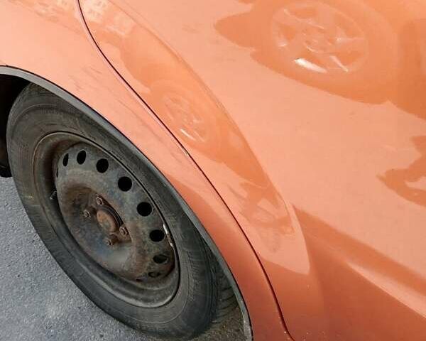 Оранжевый Шевроле Авео, объемом двигателя 1.6 л и пробегом 380 тыс. км за 3399 $, фото 5 на Automoto.ua