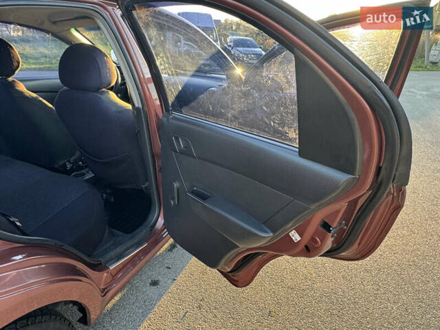 Шевроле Авео 2011 в Киеве на Automoto.ua Оранжевый Шевроле Авео, объемом двигателя 1.5 л и пробегом 286 тыс. км за 4700 $, фото 7 на Automoto.ua