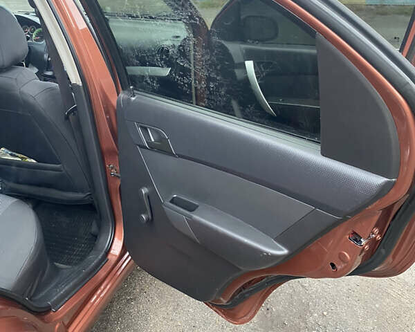 Оранжевый Шевроле Авео, объемом двигателя 1.5 л и пробегом 168 тыс. км за 4700 $, фото 12 на Automoto.ua