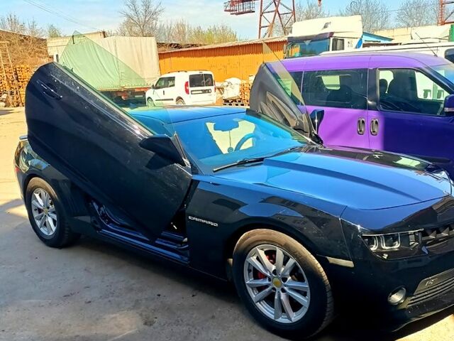 Черный Шевроле Камаро, объемом двигателя 3.6 л и пробегом 130 тыс. км за 21000 $, фото 1 на Automoto.ua