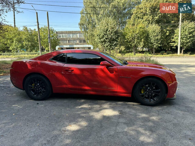 Красный Шевроле Камаро, объемом двигателя 3.6 л и пробегом 300 тыс. км за 11700 $, фото 2 на Automoto.ua