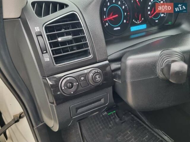 Белый Шевроле Каптива, объемом двигателя 2.38 л и пробегом 230 тыс. км за 9400 $, фото 49 на Automoto.ua