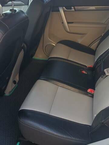 Белый Шевроле Каптива, объемом двигателя 2.23 л и пробегом 205 тыс. км за 11900 $, фото 24 на Automoto.ua