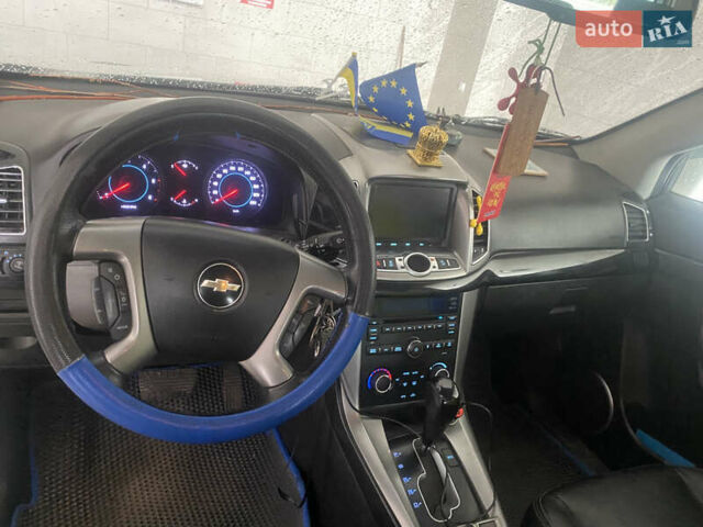 Белый Шевроле Каптива, объемом двигателя 2.23 л и пробегом 170 тыс. км за 10750 $, фото 1 на Automoto.ua