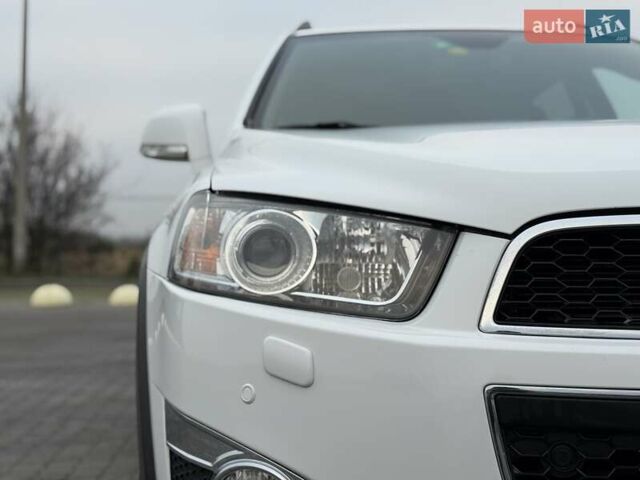 Белый Шевроле Каптива, объемом двигателя 2.2 л и пробегом 150 тыс. км за 12200 $, фото 61 на Automoto.ua