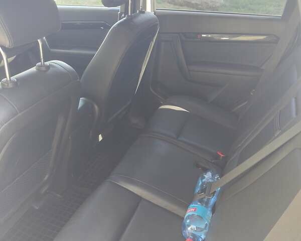 Шевроле Каптива 2012 в Каменское - Днепродзержинск на Automoto.ua Белый Шевроле Каптива, объемом двигателя 2.4 л и пробегом 176 тыс. км за 10500 $, фото 9 на Automoto.ua