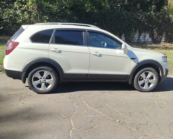 Шевроле Каптива 2012 в Каменское - Днепродзержинск на Automoto.ua Белый Шевроле Каптива, объемом двигателя 2.4 л и пробегом 176 тыс. км за 10500 $, фото 12 на Automoto.ua