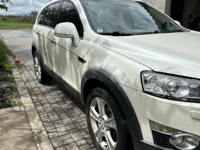 Белый Шевроле Каптива, объемом двигателя 2.2 л и пробегом 162 тыс. км за 11000 $, фото 1 на Automoto.ua