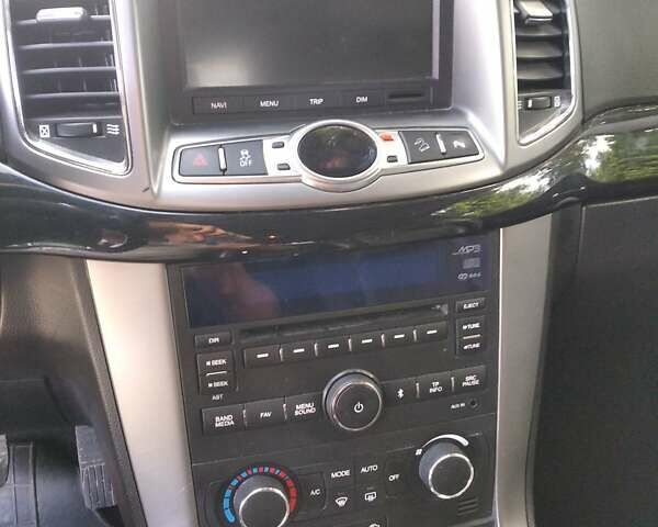 Белый Шевроле Каптива, объемом двигателя 2.2 л и пробегом 225 тыс. км за 10500 $, фото 11 на Automoto.ua