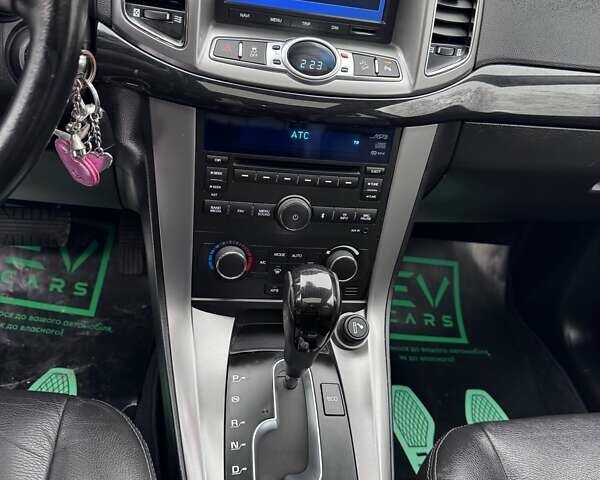 Белый Шевроле Каптива, объемом двигателя 2.2 л и пробегом 87 тыс. км за 12800 $, фото 30 на Automoto.ua