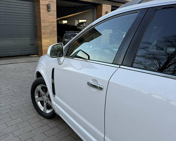 Белый Шевроле Каптива, объемом двигателя 2.38 л и пробегом 173 тыс. км за 9300 $, фото 5 на Automoto.ua