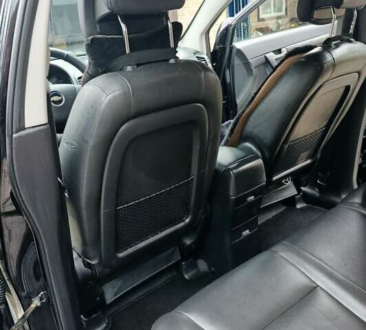 Черный Шевроле Каптива, объемом двигателя 2.41 л и пробегом 173 тыс. км за 7450 $, фото 12 на Automoto.ua