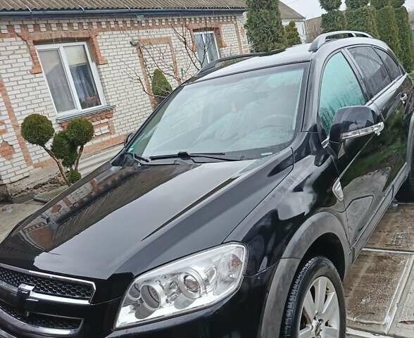 Черный Шевроле Каптива, объемом двигателя 2.41 л и пробегом 173 тыс. км за 7450 $, фото 2 на Automoto.ua