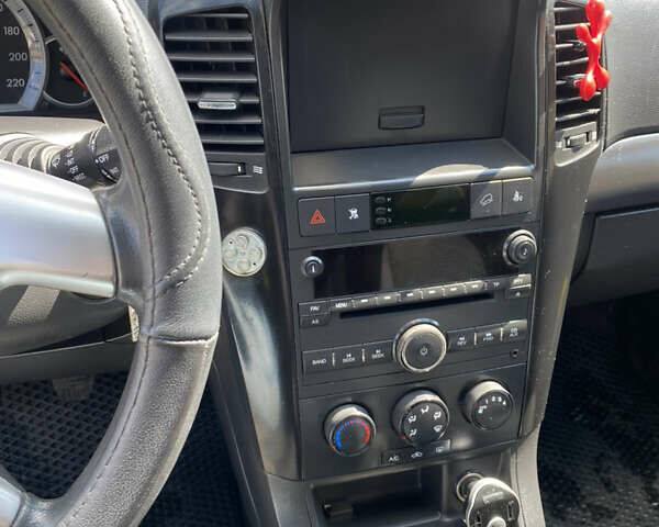 Черный Шевроле Каптива, объемом двигателя 2.41 л и пробегом 302 тыс. км за 7000 $, фото 13 на Automoto.ua