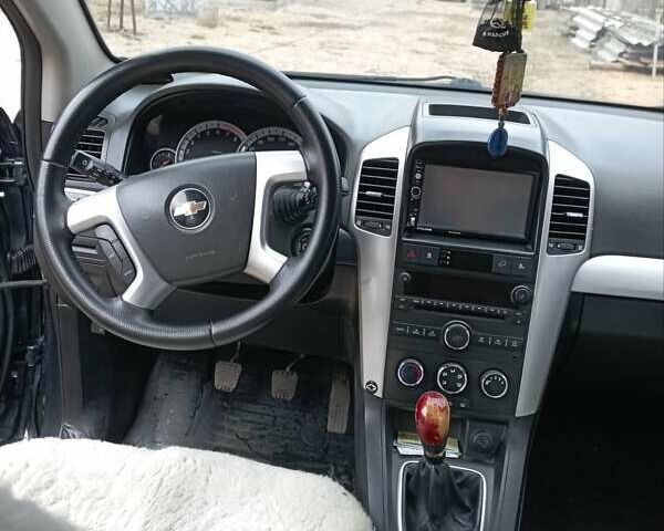 Черный Шевроле Каптива, объемом двигателя 2.4 л и пробегом 234 тыс. км за 8800 $, фото 4 на Automoto.ua