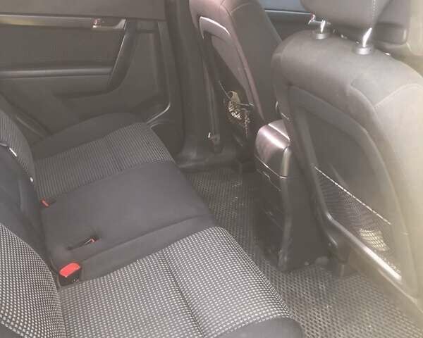 Черный Шевроле Каптива, объемом двигателя 2.41 л и пробегом 282 тыс. км за 6700 $, фото 5 на Automoto.ua