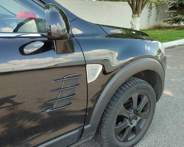 Чорний Шевроле Каптіва, об'ємом двигуна 2 л та пробігом 317 тис. км за 7000 $, фото 5 на Automoto.ua