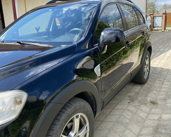 Черный Шевроле Каптива, объемом двигателя 2.41 л и пробегом 302 тыс. км за 7000 $, фото 1 на Automoto.ua