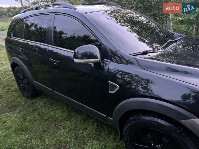 Черный Шевроле Каптива, объемом двигателя 2.4 л и пробегом 250 тыс. км за 8100 $, фото 2 на Automoto.ua