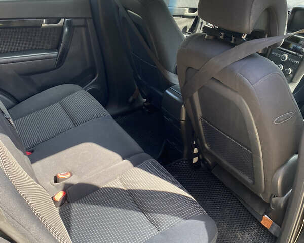 Черный Шевроле Каптива, объемом двигателя 2.41 л и пробегом 302 тыс. км за 7000 $, фото 7 на Automoto.ua