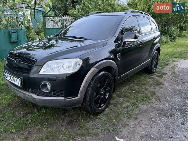 Черный Шевроле Каптива, объемом двигателя 2.4 л и пробегом 250 тыс. км за 8100 $, фото 10 на Automoto.ua