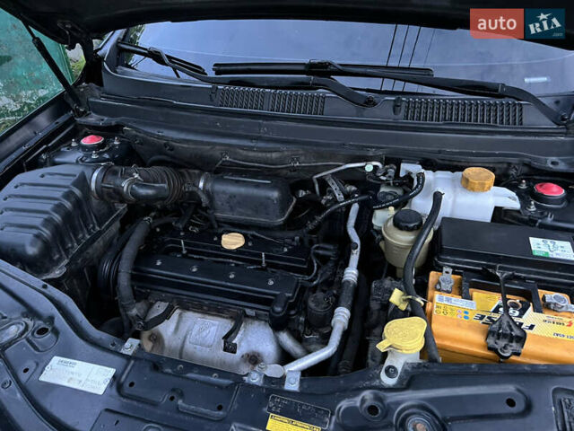 Черный Шевроле Каптива, объемом двигателя 2.4 л и пробегом 250 тыс. км за 8100 $, фото 11 на Automoto.ua