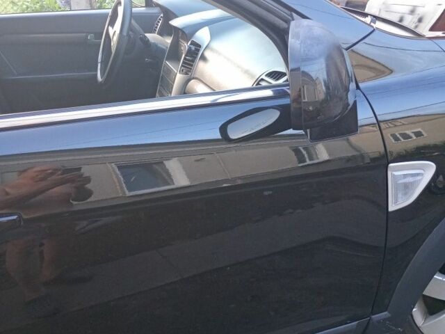 Черный Шевроле Каптива, объемом двигателя 2.4 л и пробегом 296 тыс. км за 6800 $, фото 2 на Automoto.ua