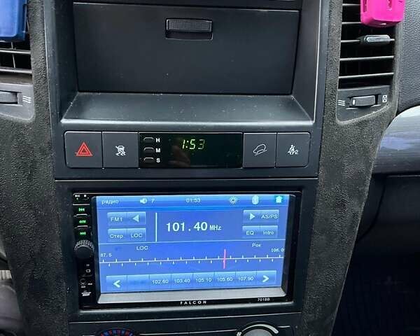 Черный Шевроле Каптива, объемом двигателя 2.4 л и пробегом 188 тыс. км за 7999 $, фото 6 на Automoto.ua