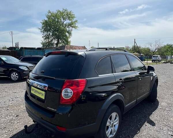 Черный Шевроле Каптива, объемом двигателя 2.41 л и пробегом 221 тыс. км за 6990 $, фото 5 на Automoto.ua