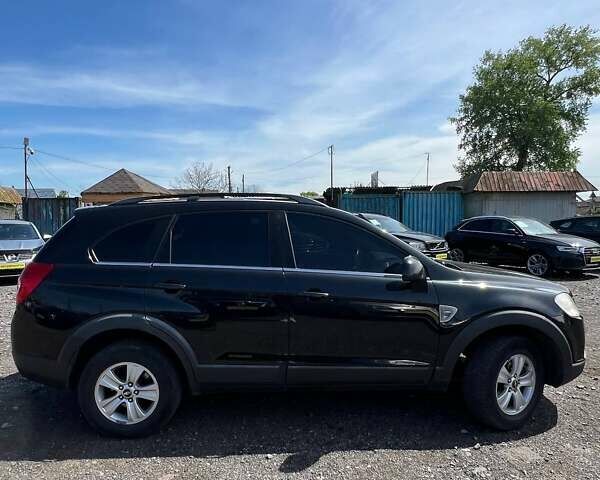 Черный Шевроле Каптива, объемом двигателя 2.41 л и пробегом 221 тыс. км за 6990 $, фото 10 на Automoto.ua