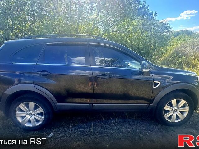 Чорний Шевроле Каптіва, об'ємом двигуна 2.4 л та пробігом 100 тис. км за 9500 $, фото 1 на Automoto.ua