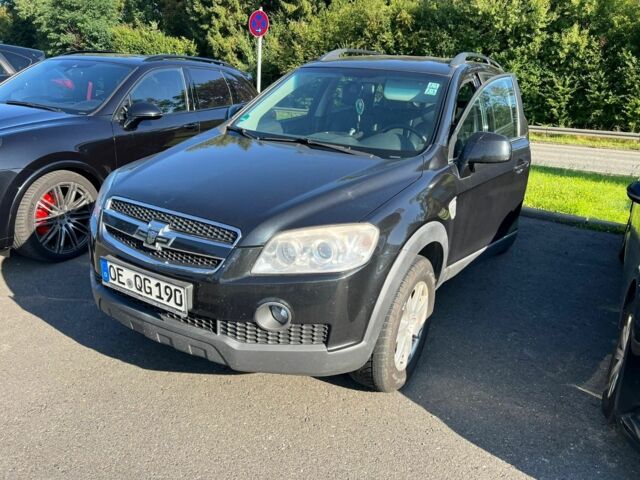 Черный Шевроле Каптива, объемом двигателя 2.4 л и пробегом 250 тыс. км за 5000 $, фото 1 на Automoto.ua