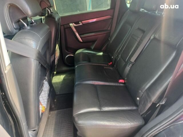 Черный Шевроле Каптива, объемом двигателя 2.4 л и пробегом 180 тыс. км за 8000 $, фото 1 на Automoto.ua