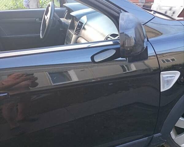 Черный Шевроле Каптива, объемом двигателя 2.4 л и пробегом 298 тыс. км за 7200 $, фото 3 на Automoto.ua