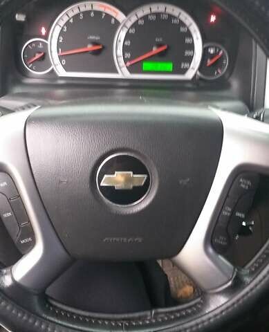 Черный Шевроле Каптива, объемом двигателя 2.4 л и пробегом 280 тыс. км за 7100 $, фото 2 на Automoto.ua