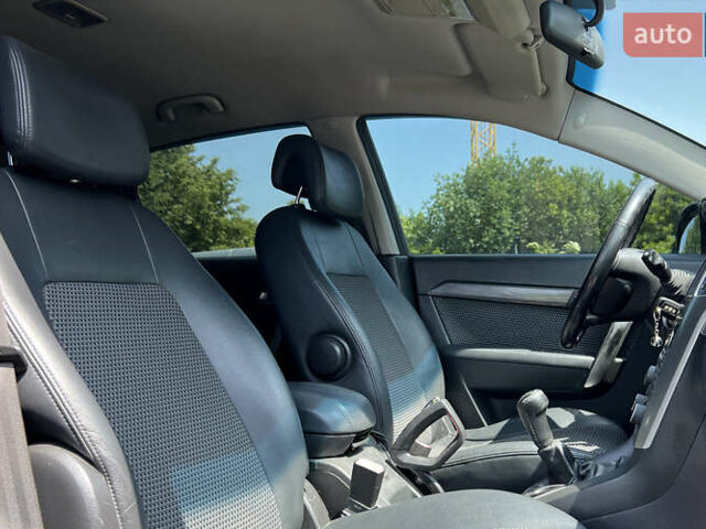 Черный Шевроле Каптива, объемом двигателя 2.41 л и пробегом 218 тыс. км за 7999 $, фото 8 на Automoto.ua