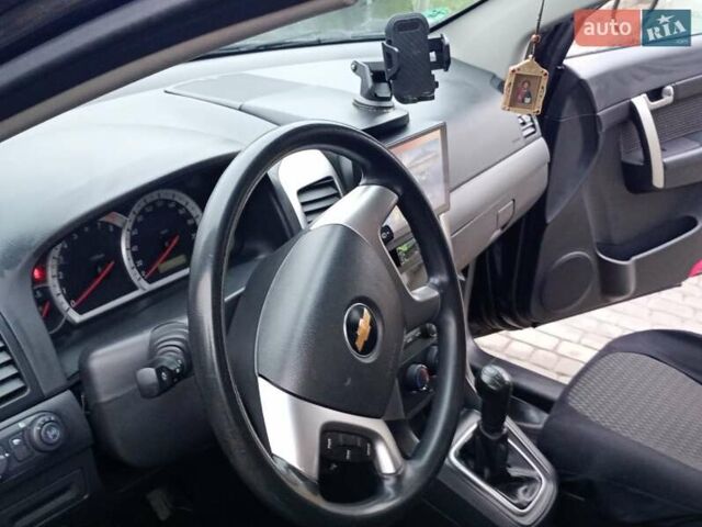 Черный Шевроле Каптива, объемом двигателя 2.41 л и пробегом 137 тыс. км за 8500 $, фото 6 на Automoto.ua