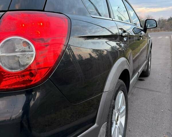 Черный Шевроле Каптива, объемом двигателя 2 л и пробегом 300 тыс. км за 3850 $, фото 2 на Automoto.ua