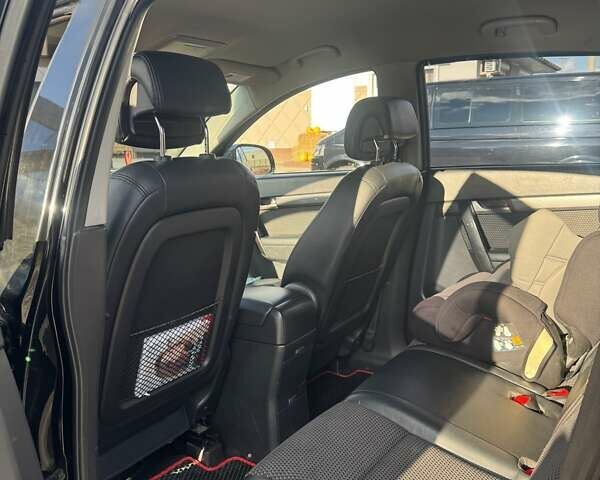 Черный Шевроле Каптива, объемом двигателя 2.41 л и пробегом 240 тыс. км за 7500 $, фото 4 на Automoto.ua