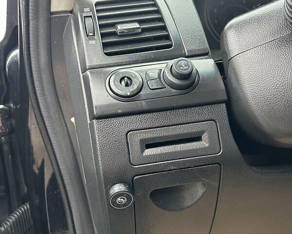 Черный Шевроле Каптива, объемом двигателя 2.4 л и пробегом 231 тыс. км за 8250 $, фото 12 на Automoto.ua