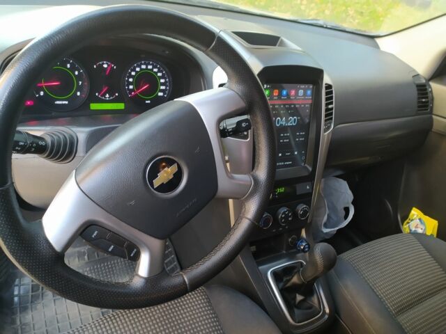 Черный Шевроле Каптива, объемом двигателя 2.4 л и пробегом 146 тыс. км за 8000 $, фото 1 на Automoto.ua